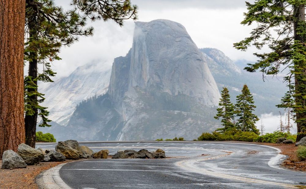 Half Dome in Yosemite National Park in October right after the rain. View from winding Glacier Point road. California, USA.